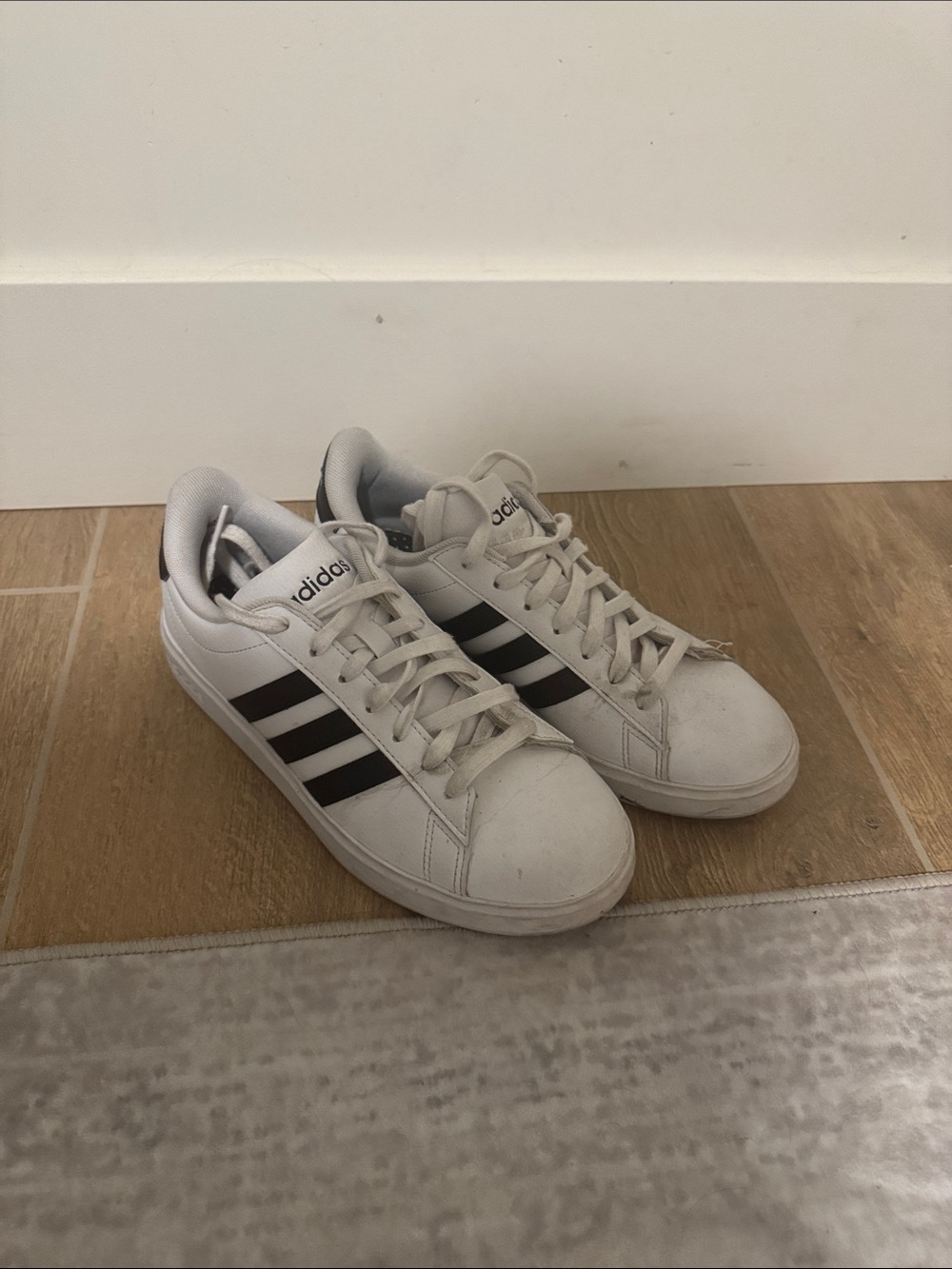 adidas White Sneakers with Black Three-Stripes